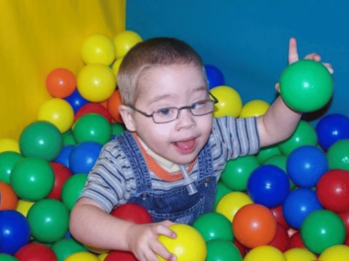 Aled playing in a ball pit